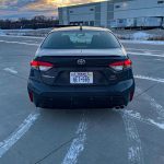 2026 Toyota Corolla Hybrid SE in Underground, sunset, rear view, taillights on,