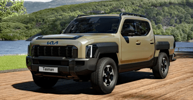 2026 Kia Tasman, What is the Kia Tasman?, front 3/4 view, green,