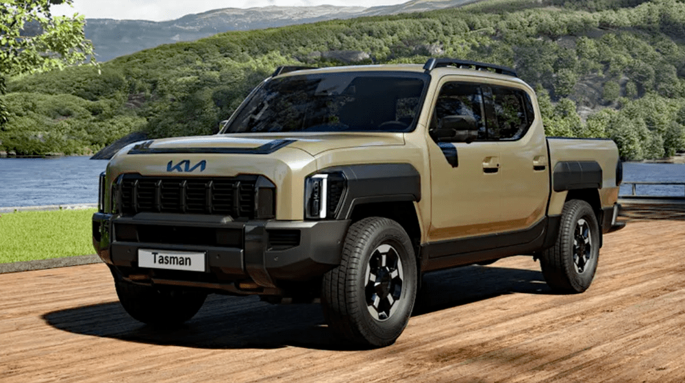 2026 Kia Tasman, What is the Kia Tasman?, front 3/4 view, green,