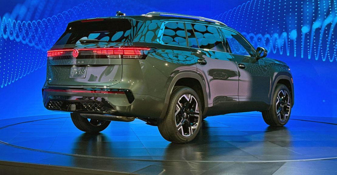 2027 Volkswagen Atlas, rear 3/4 view, taillights on,