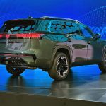 2027 Volkswagen Atlas, rear 3/4 view, taillights on,