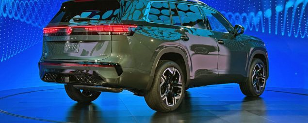 2027 Volkswagen Atlas, rear 3/4 view, taillights on,