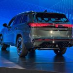 2027 Volkswagen Atlas, rear view, lights on, green,