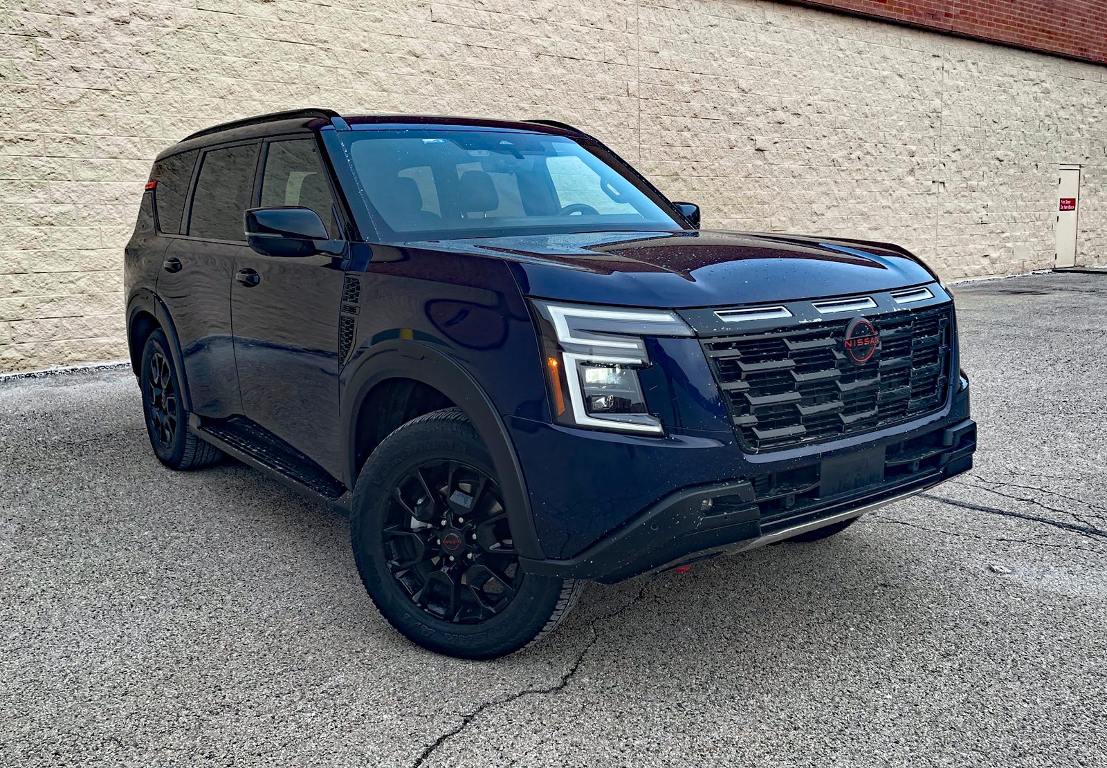 2026 Nissan Armada PRO-4X in Deep Ocean Blue Pearl, front 3/4 view,