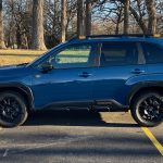 2026 Subaru Forester Wilderness in Geyser Blue, profile, in park, sunset