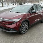 2026 Nissan Leaf Platinum+, front 3/4 view, snow,