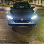 2026 Nissan Sentra SL in Imperial Bronze, front end rain, headights on,