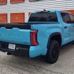 2026 Toyota Tundra TRD Pro in Wave maker with TRD Performance Package, rear 3/4 view,