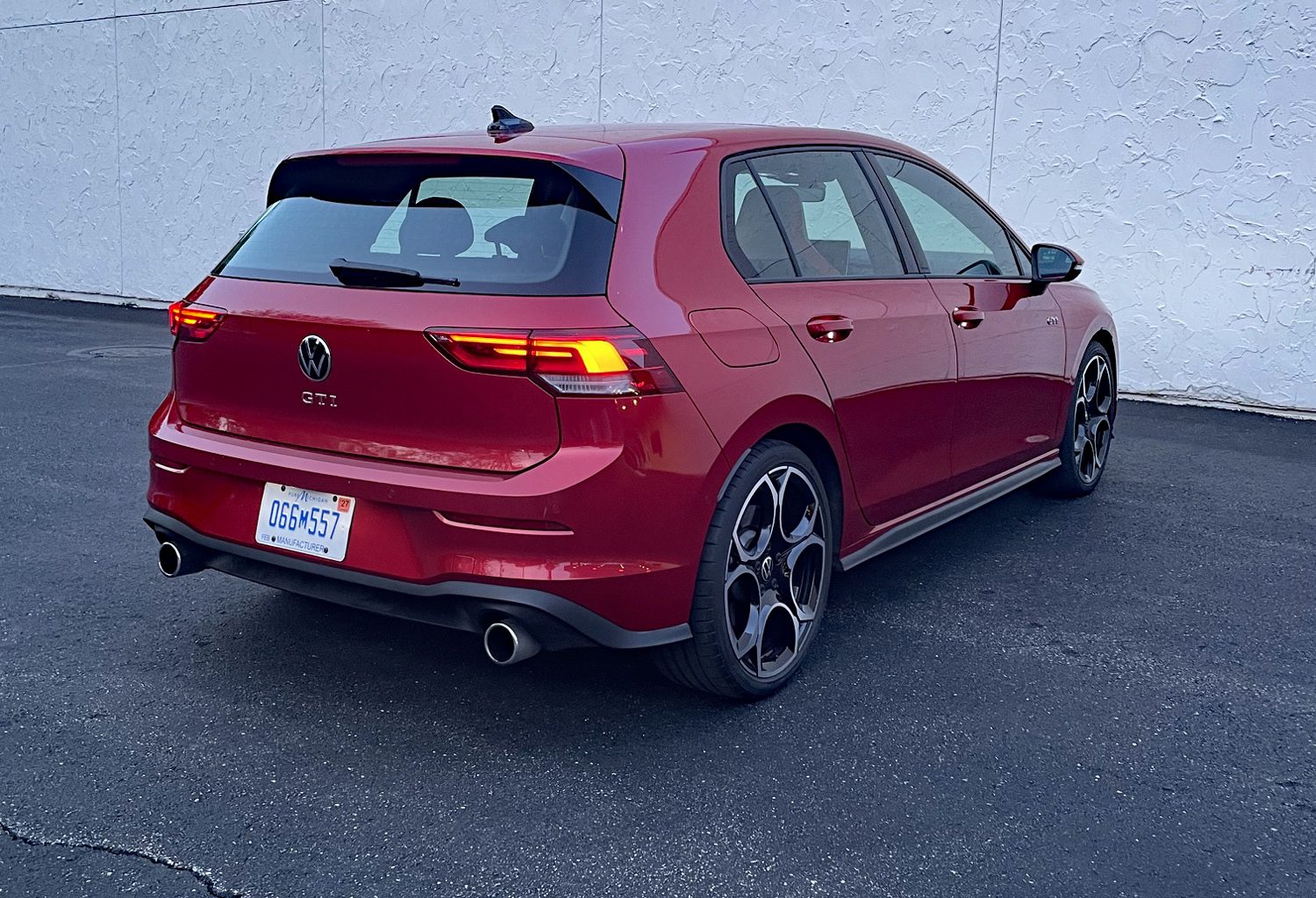 2026 Volkswagen GTI Autobahn in Kings Red, rear 3/4 view,