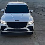 2026 GV80 Coupe Black in Uyuni White, front view, white, sunset,