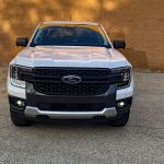 2026 Ford Ranger XLT in Colonial White, front end, front clip, magic hour, sunset,