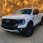 2026 Ford Ranger XLT in Colonial White, front 3/4 view,