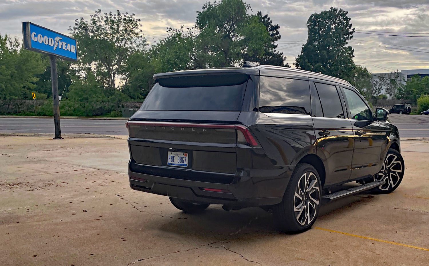 2026 Lincoln Navigator Reserve in Starlight Gray, rear 3/4 view, sunset,