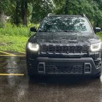 2026 Jeep Cherokee Laredo in Diamond Black Crystal, front end, rain, headlights on,