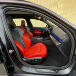 2025 BMW M5 Touring in Frozen Deep Grey, front seat, read leather,