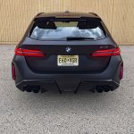 2025 BMW M5 Touring in Frozen Deep Grey, rear view,