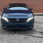 2026 Nissan Murano Platinum in Aurora Blue Pearl, front clip, headlights on,