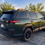 Rear 3/4 view, taillights, 2026 Subaru Outback Wilderness in Deep Emerald Green Pearl