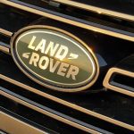 2026 Land Rover Range Rover SE in Batumi Gold, grille badge,