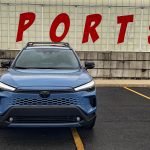 2026 Toyota Corolla Cross Hybrid XSE in Cavalry Blue, Rolling Meadows, Front end, headlights on,