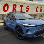 2026 Toyota Corolla Cross Hybrid XSE in Cavalry Blue, front 3/4 view,