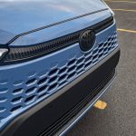 2026 Toyota Corolla Cross Hybrid XSE in Cavalry Blue, Rolling Meadows, Front end, headlights on,