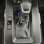 2026 Toyota Corolla Cross Hybrid XSE in Cavalry Blue, shifter, gear selector,
