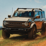 2027 Ford Bronco Filson, At speed, red, dirty