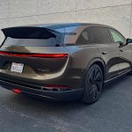 2026 Lucid Gravity Grand Touring in Supernova Bronze, rear 3/.4 view,