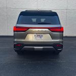 2026 Lexus LX 600 Luxury in Atomic Silver, rear view, taillights on,