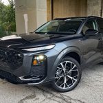 2026 Audi Q3 S Line in Daytona Gray Pearl , front 3/4, headlights on