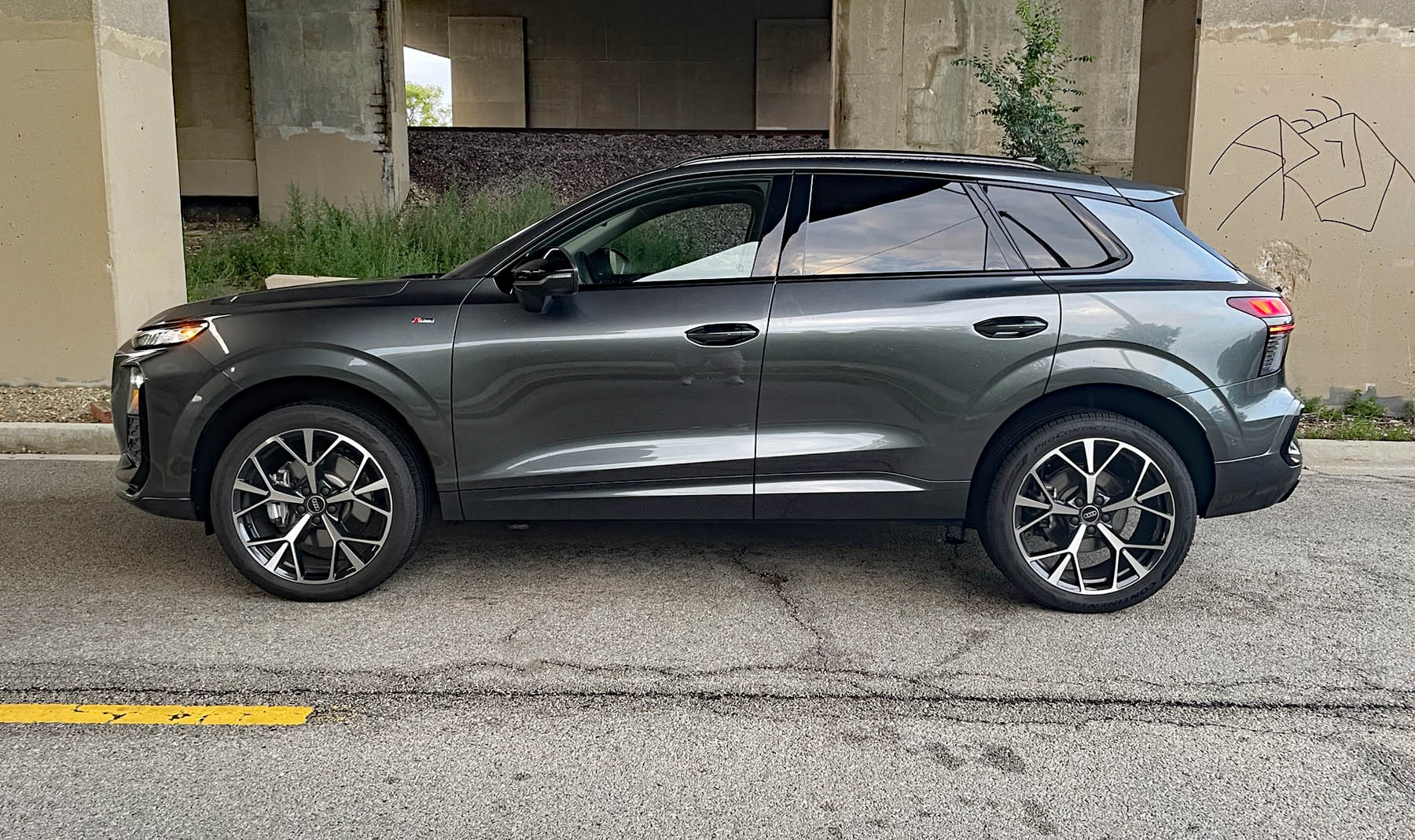 2026 Audi Q3 S Line in Daytona Gray Pearl, profile, under bridge, overpass,