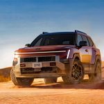 2027 Hyundai Tucson XRT Pro, front 3/4 view, sand,