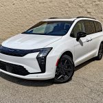 2027 Chrysler Pacifica Limited in Bright White with S Appearance Package, front 3/4 view, black wheels,
