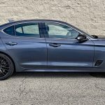 2026 Genesis G70 3.3T Prestige Graphite in Ceres Blue, side view, black wheels,