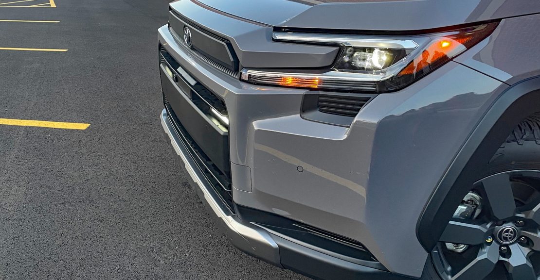 2026 Toyota RAV4 Woodland PHEV in Urban Rock, front end, detail,