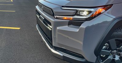 2026 Toyota RAV4 Woodland PHEV in Urban Rock, front end, detail,
