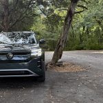 2027 Volkswagen Atlas SE, front view, woods,