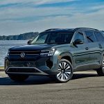 2027 Volkswagen Atlas SE, front 3/4 view, shore, ocean,