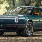 Rivian R3X Concept, green, front 3/4 view, woods,