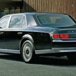 2026 Century Sedan, rear 3/4 view, black,